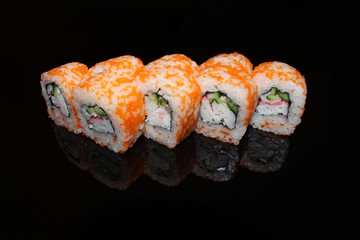 sushi on black glass