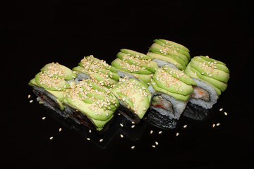 sushi on black glass
