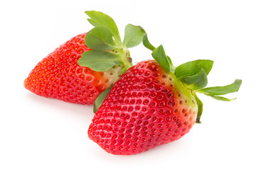 Fresh strawberries close up on white background.