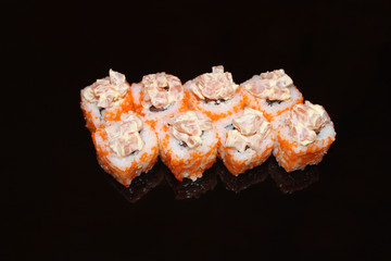 sushi on black glass