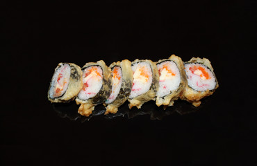 sushi on black glass