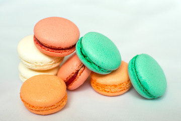 Fototapeta na wymiar Sweet and bright start of the day with macaroons