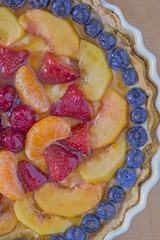 Fruit tart with custard from above.