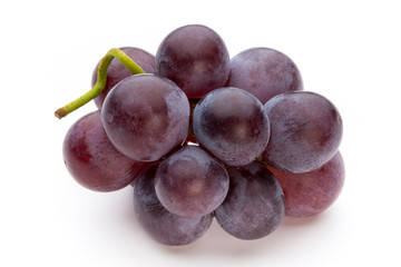 Ripe red grape isolated on white.