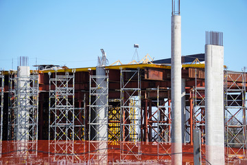 Construction of a road junction, a bridge. Laying road over piles