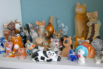 Private collection of wooden and porcelain figurines of cats from different cities and countries
