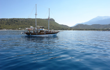 Fototapeta na wymiar On a pleasure yacht along the coastline in Kemer, Turkey.