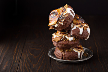 Smores donuts on dark background