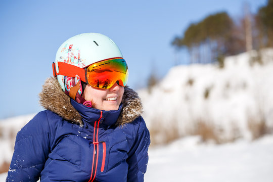 Image of female athlete in mask and helmet