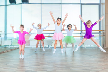 Children dancing in choreography class. happy children dancing on in hall, healthy life, kid's togethern dance kid class