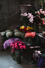 A large number of different flowers in the flower market