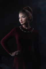 Beautiful girl with hair in a retro style