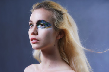 Naklejka premium Fashion portrait of the blonde with bright makeup