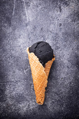 Black ice cream. Trendy food