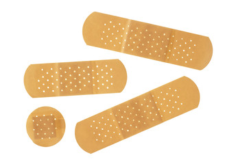 Medical adhesive plasters on a white background