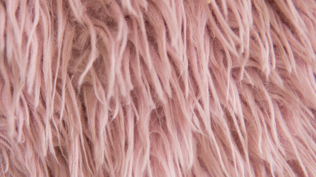 Close-up texture faux pink fur. Artificial fur