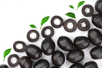 whole and sliced black olives isolated on white background with copy space for your text. Top view. Flat lay pattern
