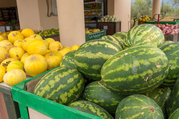 Watermelon and melon at a market place.