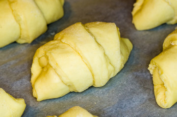raw homemade croissants with sweet filling