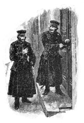 Zwei Männer stehen vor dem  Eingang eines Hauses