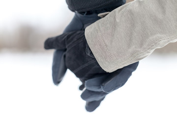 a girl is holding a male hand