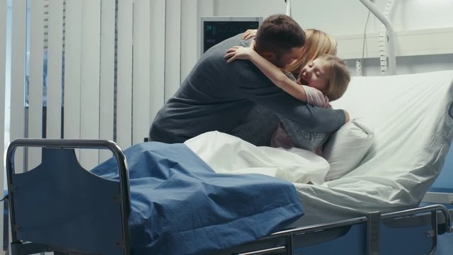  Cute Little Girl Lying in the Hospital Bed is Visited by Her Parents, They Start Hugging Her Happily! Amazing Emotional Moment, Family Bonding. Shot on RED EPIC-W 8K Helium Cinema Camera.