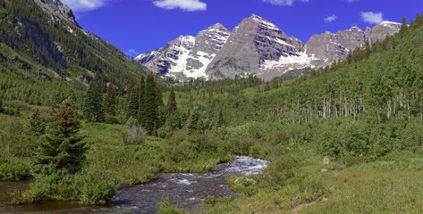 Panoramic image of beautiful alpine scene with Maroon Bells in the Rocky Mountains, Colorado