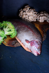 Fish with cooking ingredients, fresh, raw salmon.Close up