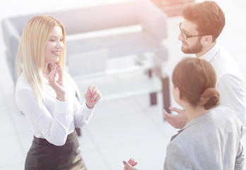 group of business people talking in office