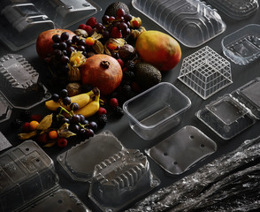 fruit and its plastic packaging still life