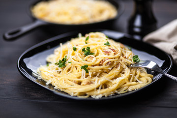 Spaghetti carbonara with egg and pancetta