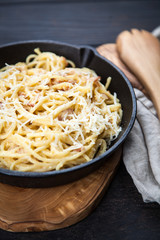 Spaghetti carbonara with egg and pancetta