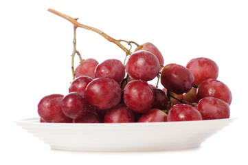 Pink grapes in a plate