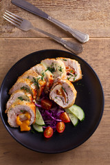 Chicken Cordon Bleu. Chicken breast wraps with ham and cheese, overhead, top view