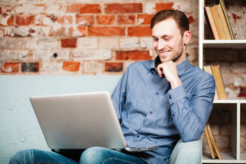 Young man with a laptop