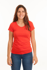 Beautiful young woman in red t shirt over white background