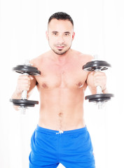 handsome sexy man with dumbell