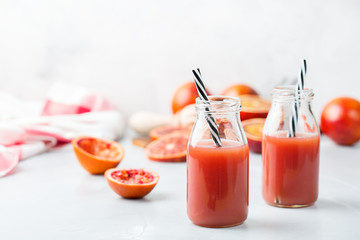 Fresh red blood orange juice in a bottle