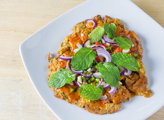 canned fish omelette on table, thai food