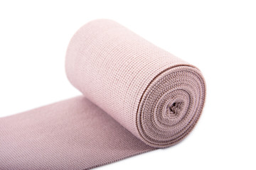 Opened elastic bandages isolated on white background