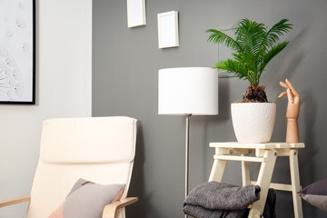 Stylish interior design with tropical leaves