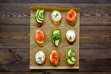 fitness breskfast with homemade sandwiches on wooden background top view mockup