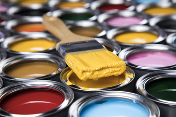 Open paint cans with a brush, Rainbow colors