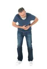 Man suffering from abdominal pain on white background