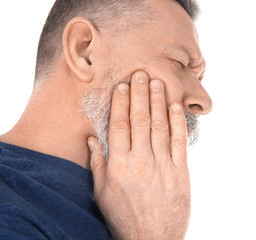 Fototapeta premium Man suffering from toothache on white background