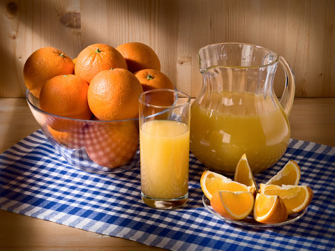 Oranges, juice in glassware