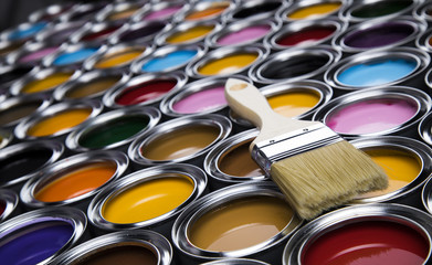 Open paint cans with a brush, Rainbow colors