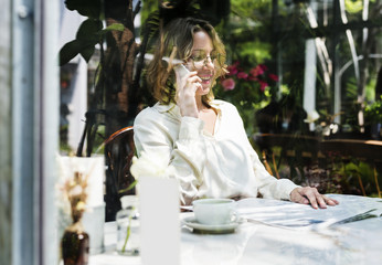 Business people reading newspaper