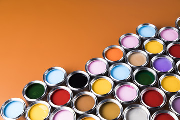 Full Buckets of rainbow colored oil paint