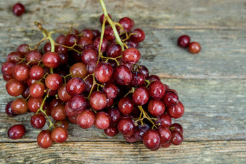 Red Grapes on a wooden board , Still Life